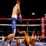 Boxer Aamer Khan wins a close, hard contest