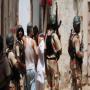 Four policemen were injured in a bomb attack in Karachi